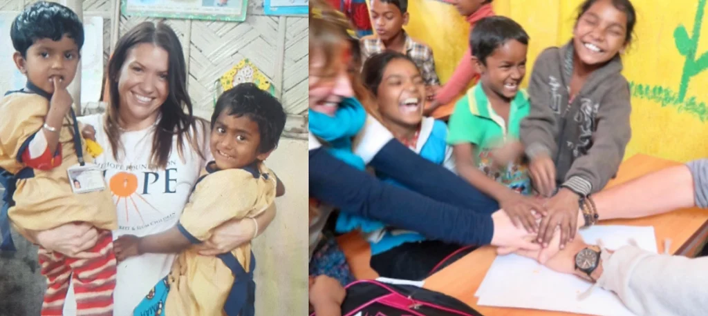 Laura carrying two toddlers of Bhagar creche